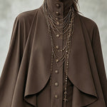 Chocolate high-neck mini dress with cape-style paneling