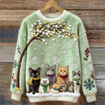 Baumwollpullover mit Katzen unter verschneitem Baum mit Schals