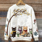 Baumwollpullover mit Katzen unter verschneitem Baum mit Schals