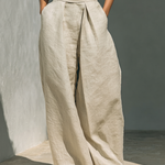 Aurora | Set consisting of a sleeveless beige top and wide-leg pants