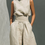 Aurora | Set consisting of a sleeveless beige top and wide-leg pants
